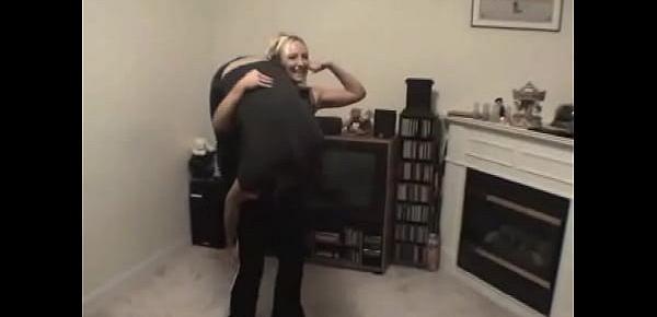  Guy Gets Reverse Over The Shoulder Carry By Giggling Blonde